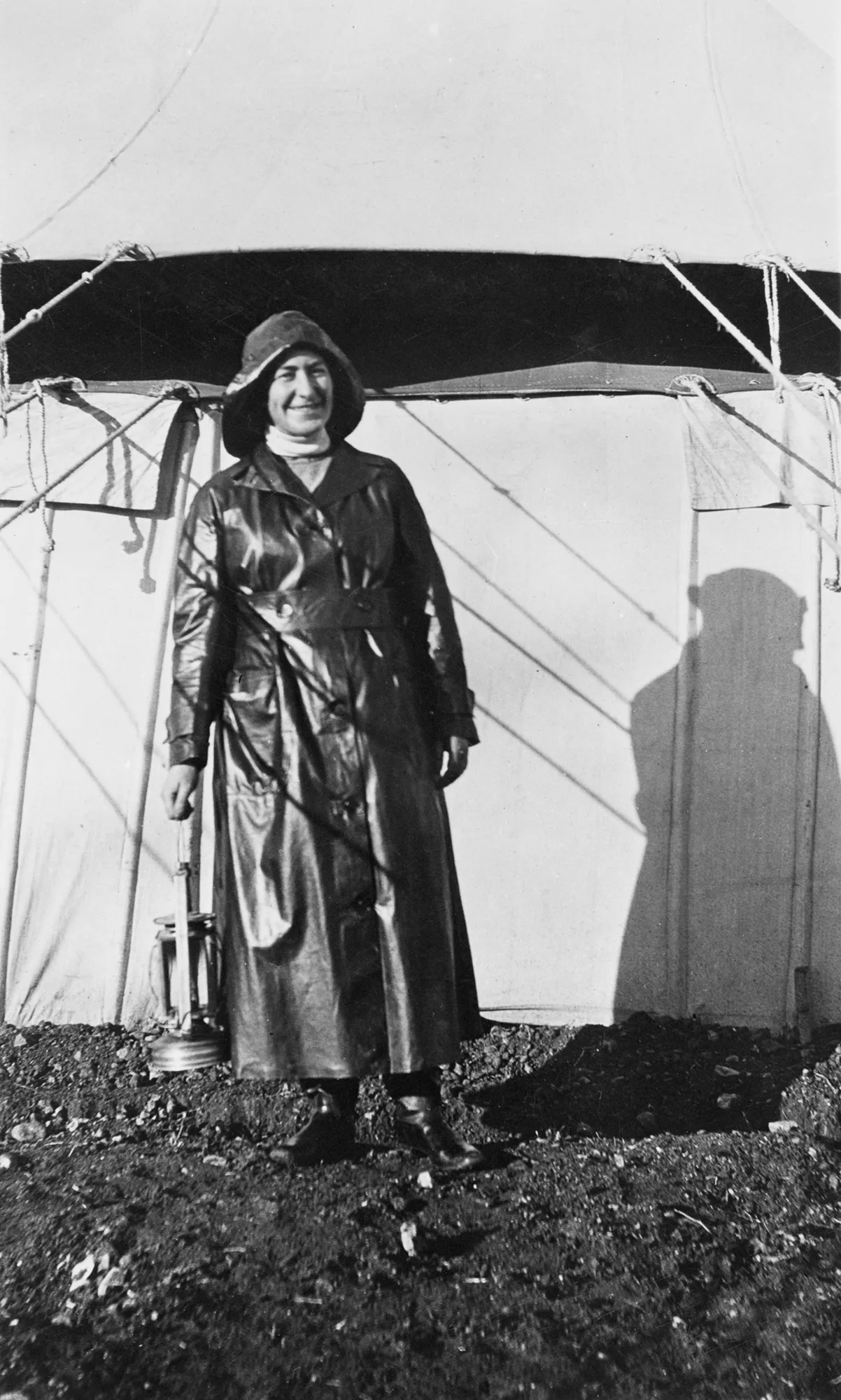 Informal portrait of Sister Evelyn Davies on Lemnos, dressed in wet weather clothing.