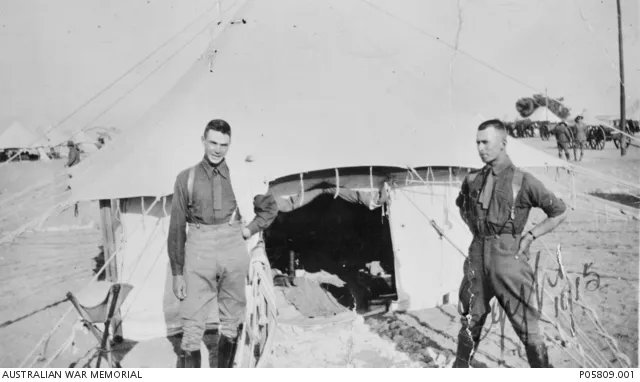 Informal portrait of Lieutenant (Lt) Noel Ernest Biden (left) and Lt Richard John Dyer, 1st Field